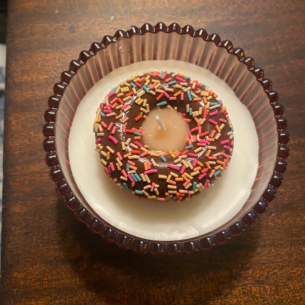 Adorable Donut Sprinkle Soy Candle in pink bow lidded glass jar. Donut scent